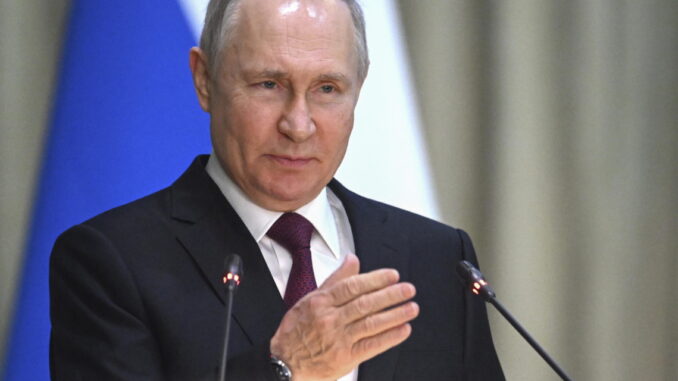Russian President Vladimir Putin attends the Prosecutor General's Office board putin